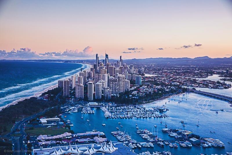 Main Beach with Surfers Paradise skyline and Hinterland as a backdrop at sunset
